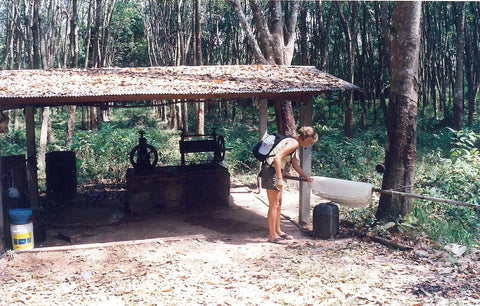 Mia in 2003 in Thailand taking a look at a rubber farm