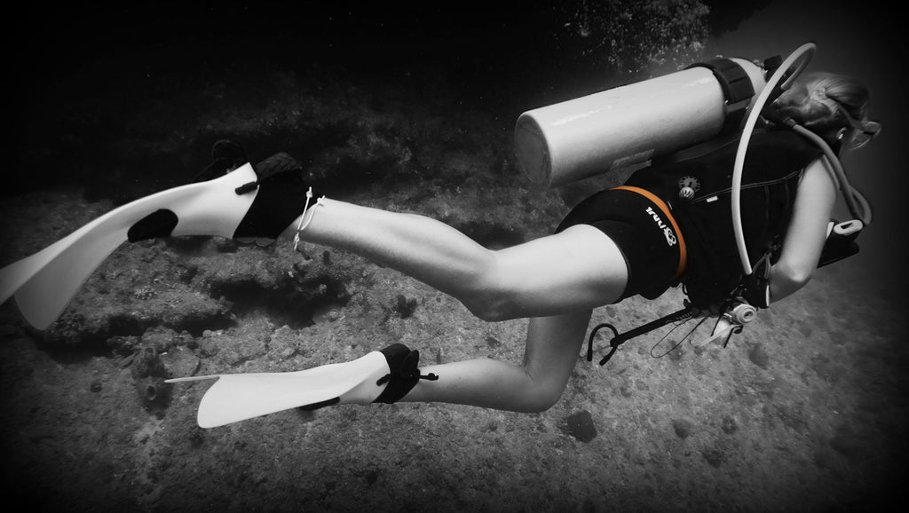 Sexy women's wetsuit ambassador and Truli Girl Wendy Ceccarelli by Truli Wetsuits