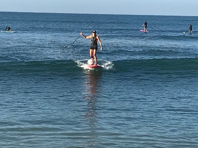 Kristin Thomas SUP surf in her Truli Wetsuits